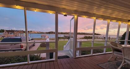 Waterfront Home with a private dock, hottub, and 3 miles to the beach