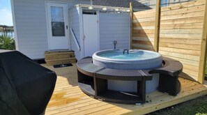 Terrace/patio - Private cottage at the end of the road with hot tub, swim mat, kayaks, and a your private dock, 3 miles to the beach. (Cedar Point)
