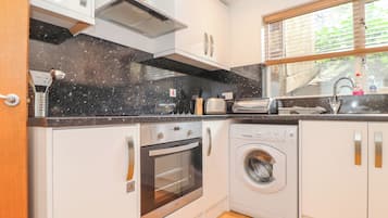 Fridge, dishwasher, electric kettle, toaster