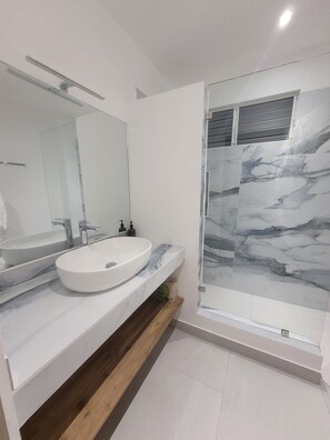Shower, hair dryer, towels, soap