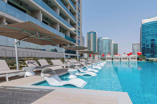 Outdoor pool - Brand New Studio in Business Bay - MAG (Dubai)