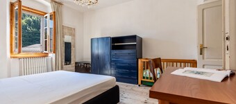 Appartamento "Casa Nel Borgo Iris" con vista sulle montagne e giardino in comune