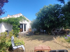 Relax in a serene, country-style setting with a peaceful atmosphere, perfect for a quiet retreat.