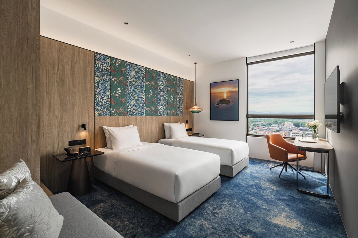 1 dormitorio, ropa de cama hipoalergénica, edredones de plumas y minibar