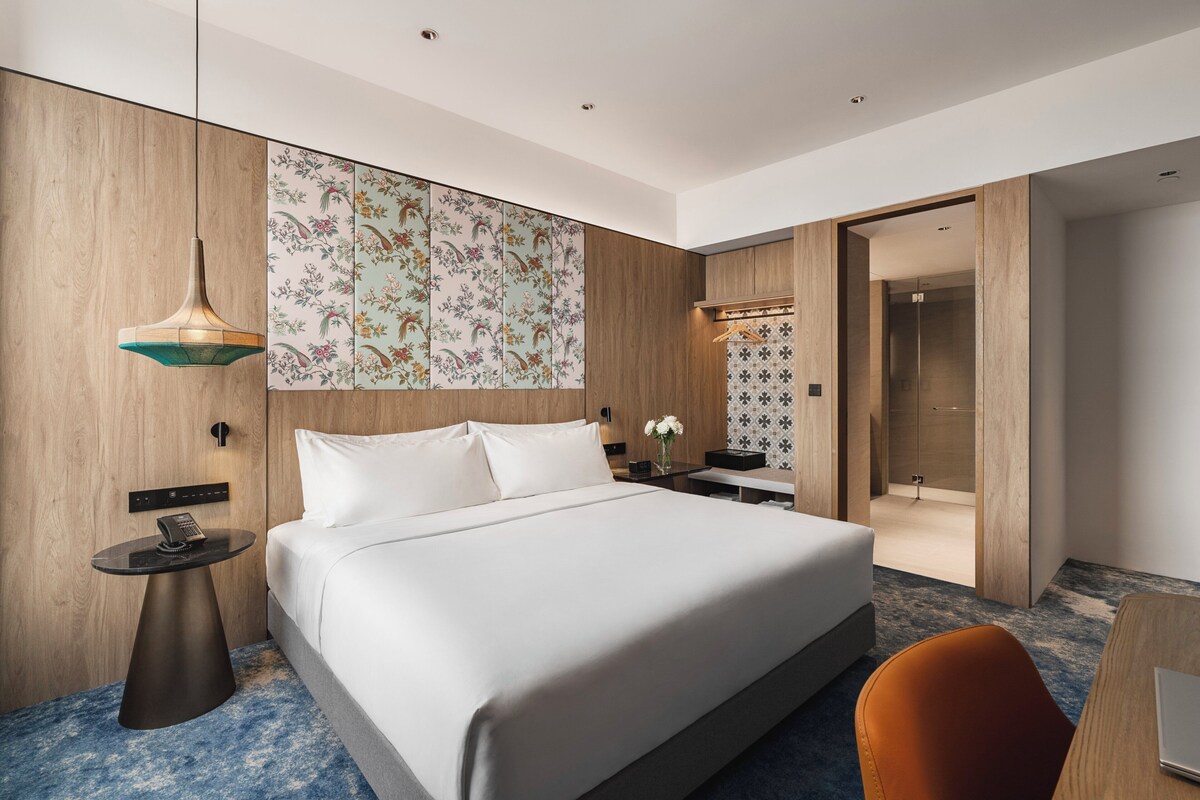 1 dormitorio, ropa de cama hipoalergénica, edredones de plumas y minibar