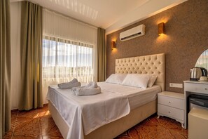 Free minibar items, blackout curtains, soundproofing, bed sheets - Belong Hotel (Cesme)