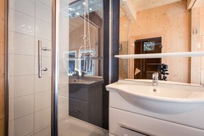 Bathtub, hair dryer, towels