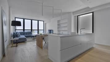 Superior-Apartment, Mehrere Betten, Nichtraucher, Meerblick | Wohnbereich