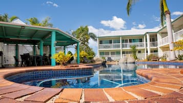 Outdoor pool, pool umbrellas, sun loungers