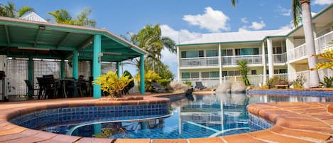 Outdoor pool, pool umbrellas, sun loungers