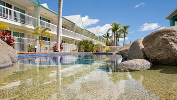 Outdoor pool, pool umbrellas, sun loungers
