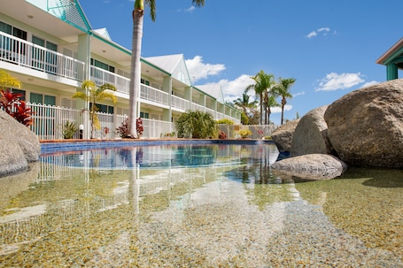 Outdoor pool, pool umbrellas, sun loungers