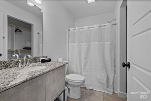 Bathtub, hair dryer, towels