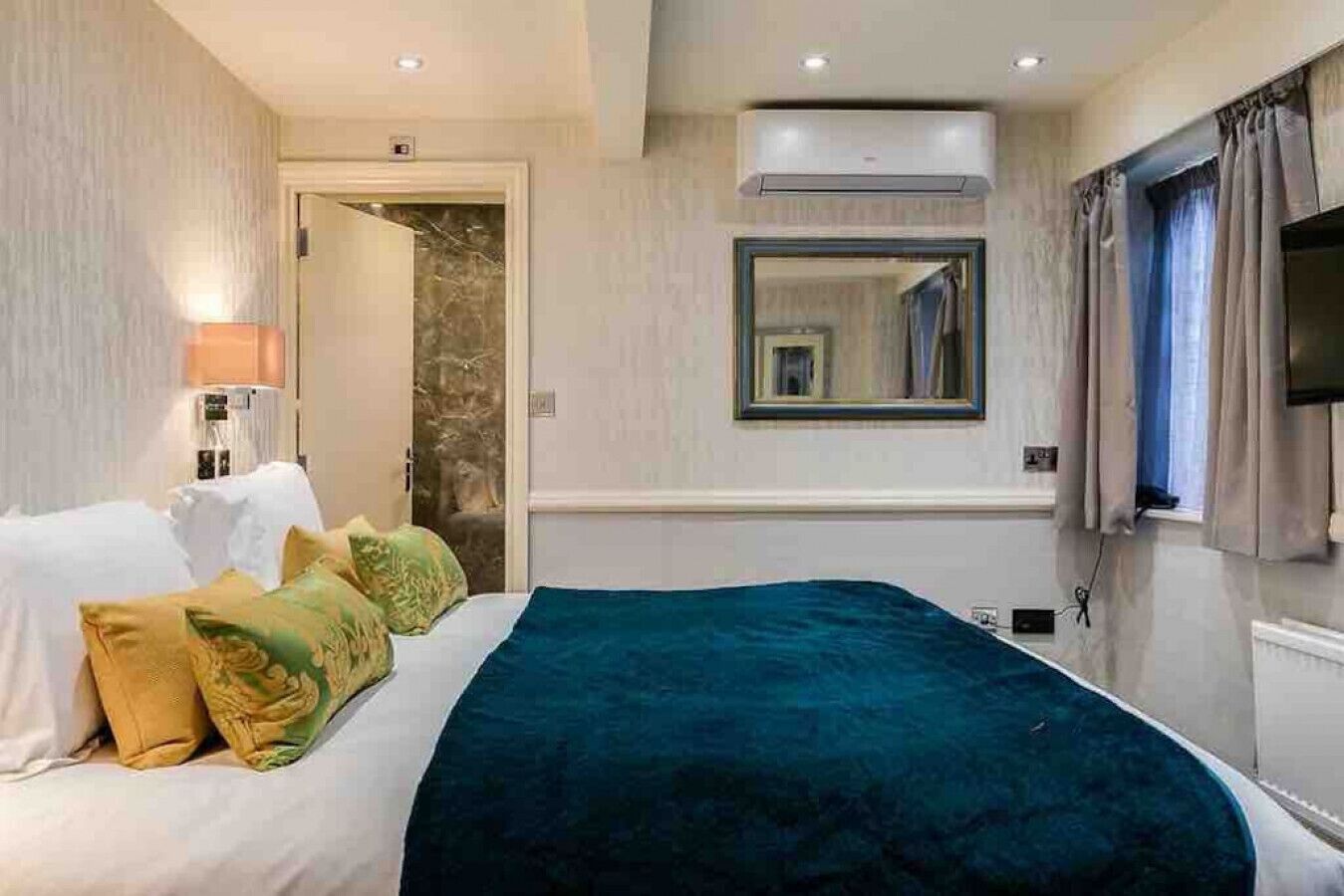 1 bedroom, desk, iron/ironing board, travel crib