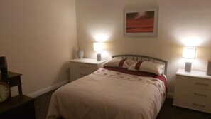 2 bedrooms, desk, iron/ironing board, travel crib