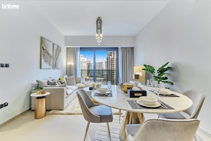 Premium Apartment, 1 King Bed, City View | Dining room - bnbme | Act One Act Two | 1 BDR (Dubai)