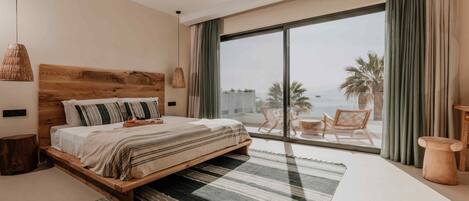 Suite superior, vista al mar | 1 habitación, ropa de cama de alta calidad, minibar y wifi gratis
