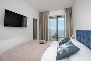 Apartment, 1 Bedroom, Balcony, Sea View | 2 bedrooms, cots/infant beds, bed sheets - Bulwar Zachodzącego Słońca by Renters (Darlowo)