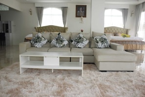 Grand Suite | Living area | 42-inch LCD TV with cable channels - Narong Ek Residence View & Pool Villa (Patong)