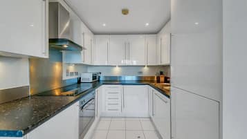 Apartment | Private kitchen | Fridge, microwave, oven, stovetop