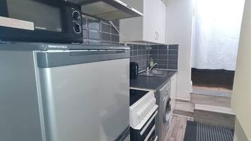 Apartment | Private kitchen | Fridge, microwave, oven, stovetop