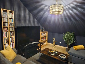 Smart TV, DVD player, books, music library