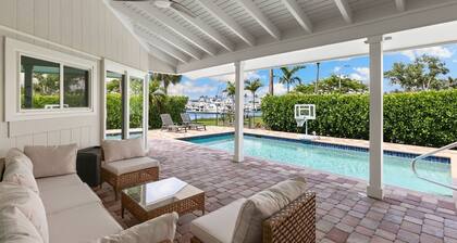 Recently updated 3 bedroom 2 bath waterfront home with spacious outdoor pool area