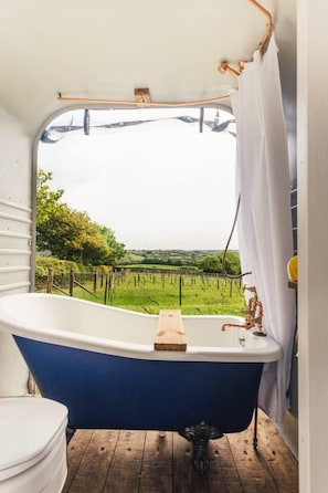 Cabin, 1 Queen Bed | Bathroom | Combined shower/tub, deep soaking tub, hair dryer, towels