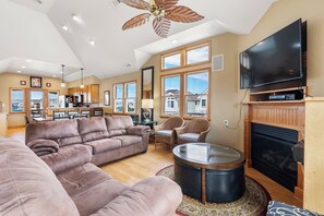 Téléviseur, jeux vidéo, table de baby-foot