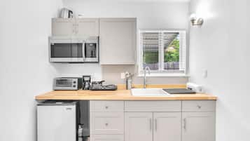 Microwave, stovetop, dishwasher, coffee/tea maker