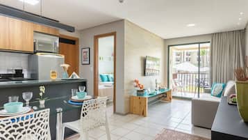 Basic Apartment | Living area | 32-inch Smart TV with cable channels