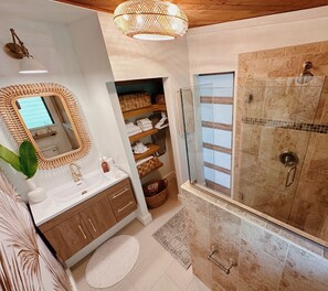 Shower, hair dryer, towels