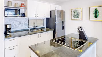Fridge, microwave, stovetop, coffee/tea maker