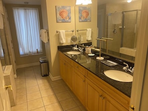 Shower, jetted tub, hair dryer, towels