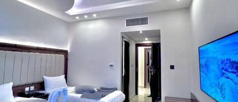 Chambre avec lits jumeaux | Fer et planche à repasser, Wi-Fi gratuit