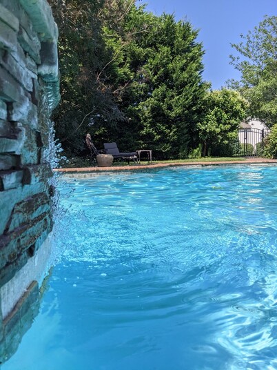 Comfortable, bright home with heated pool/spa, large deck, and yard.