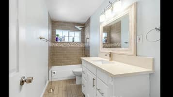 Hair dryer, towels, soap, toilet paper