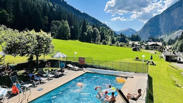 Seasonal outdoor pool, pool umbrellas, sun loungers