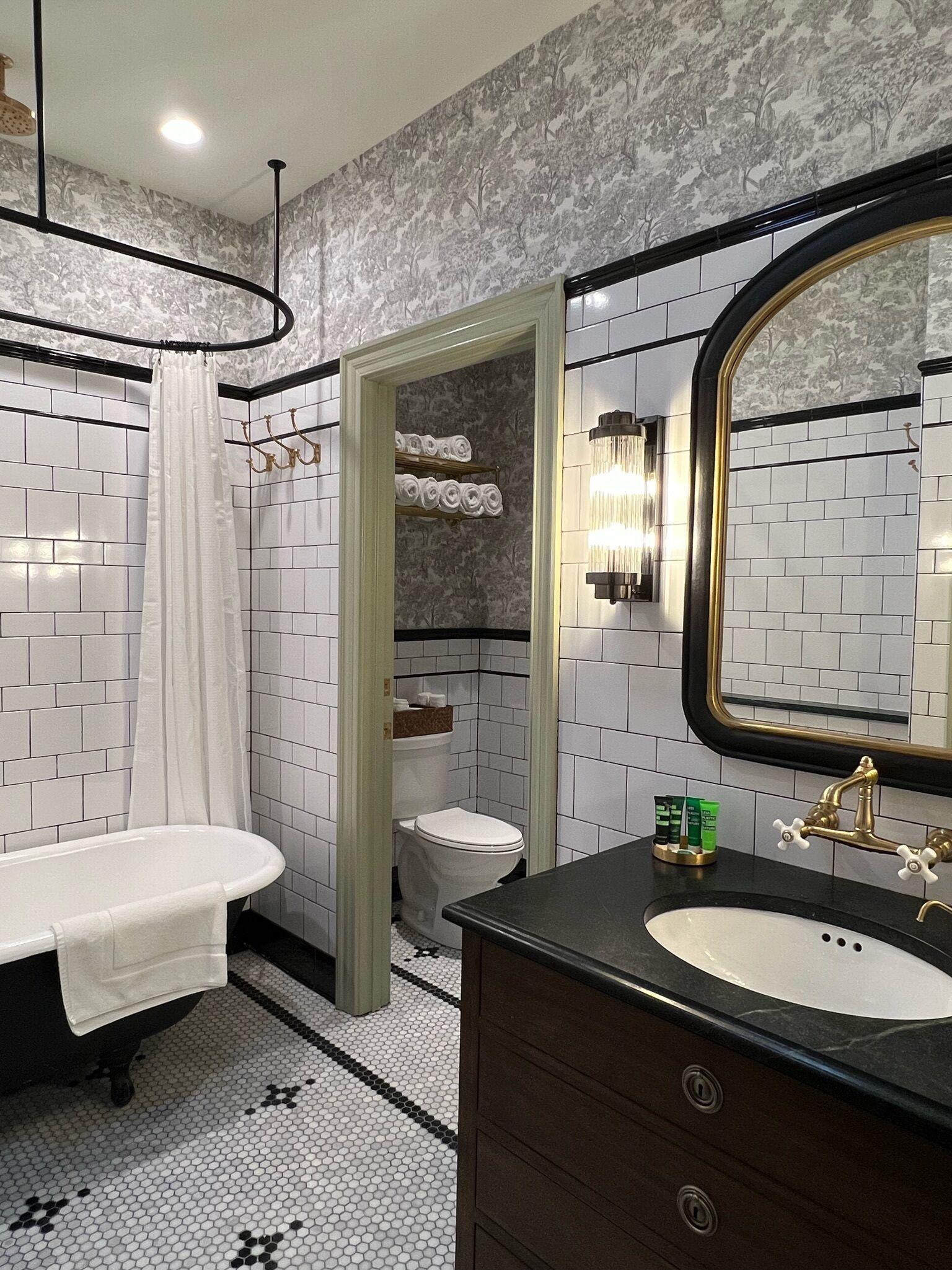Bathtub, eco-friendly toiletries, hair dryer, towels