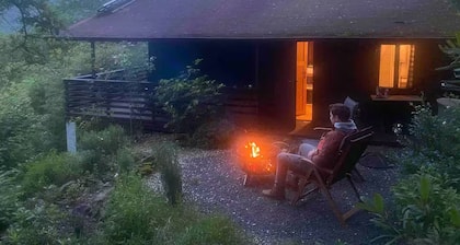 Cozy self-sufficient cottage with wonderful views & fireplace Pets welcome.