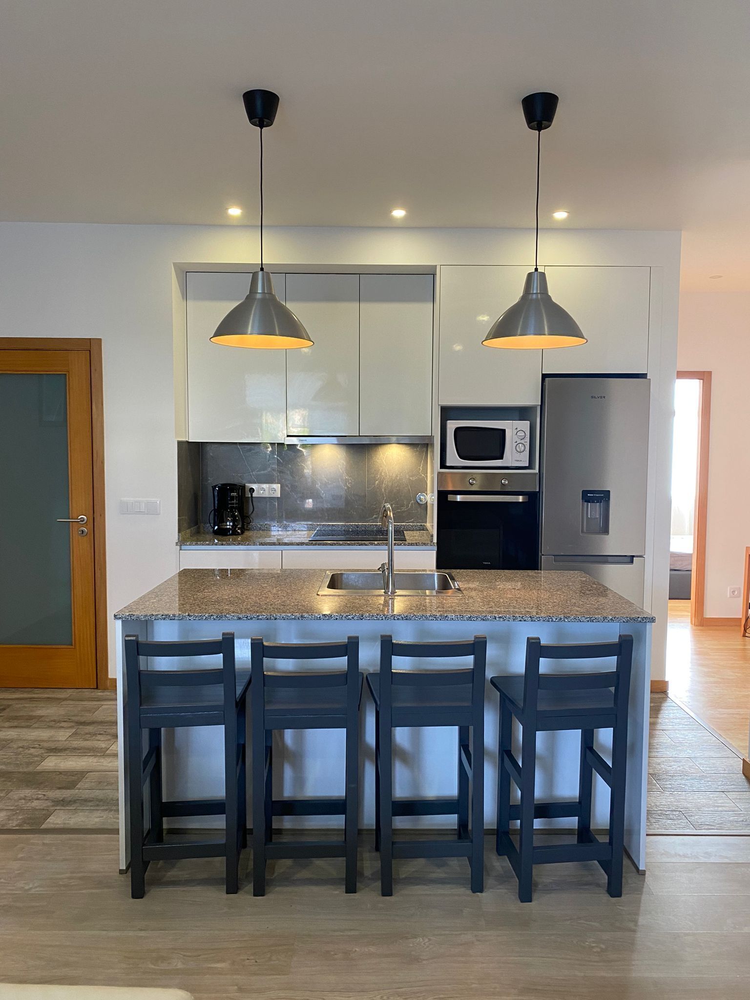 Fridge, oven, electric kettle, toaster