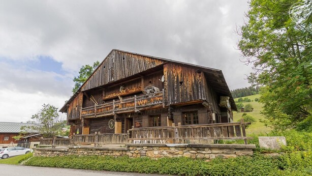 A rustic wooden building with a stone foundation, a balcony, and a sign indicating it is a restaurant. - LE PLANAY - NOTRE DAME DE BELLECOMBE (NOTRE DAME DE BELLECOMBE)