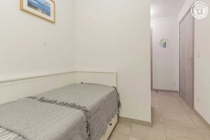 1 bedroom, iron/ironing board, travel crib