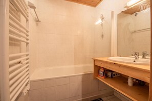 Bañera, secador de pelo