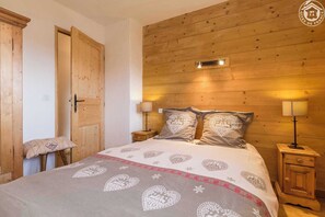 2 habitaciones, tabla de planchar con plancha y cuna de viaje 