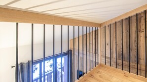 A wooden staircase with metal railings leading to a balcony. - ROND-POINT DES PISTES - INTERLUDE (TIGNES)