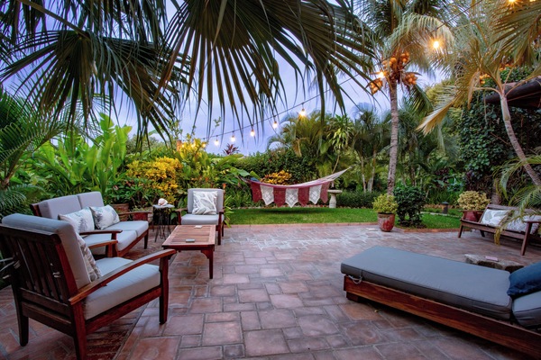 wrap around patio. comfortable furniture sets. hammock.Double chaise lounge.