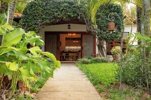 Property grounds - Rancho Santana. Charming garden Casita V-14 surrounded by tropical gardens. (Tola)