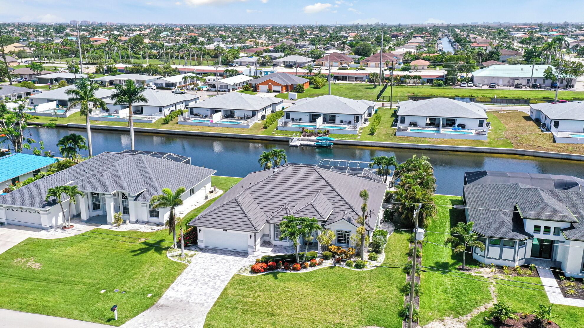 Relax in style with private pool, spacious kitchen, backed up to canal!