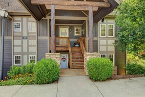 A two-story building with a wooden staircase leading to a porch. - Peace at Echota - Direct Grandfather Mtn Views! (Banner Elk)